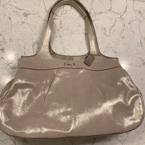 Stunning shimmering beige Coach Hobo bag.